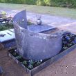 memorial stone - the so-called 'weathering steel' is still to form it's stable rust-like appearance